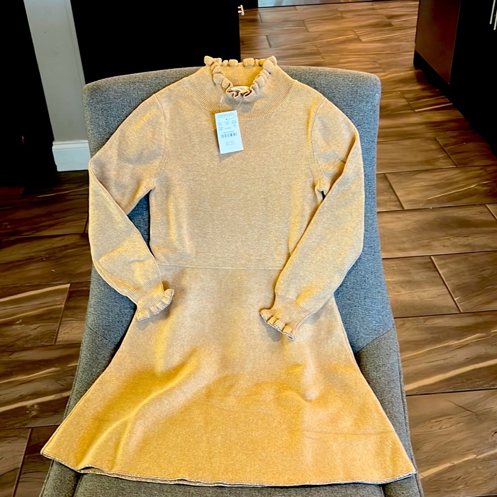Little girls sz 7 dress tan w/gold around cuffs and bottom new with tags.